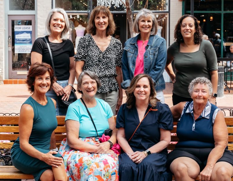 group of women sitting for picture